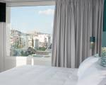 Room image #5 at Athenaeum Smart Hotel